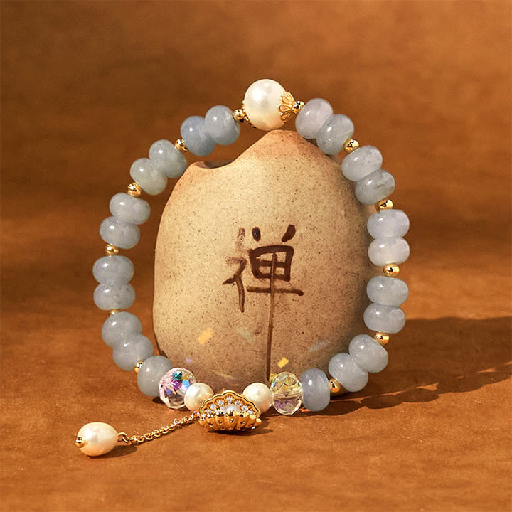 Bracelet de perles de guérison en coquillages et aigue-marines naturelles de Buddha Stones
