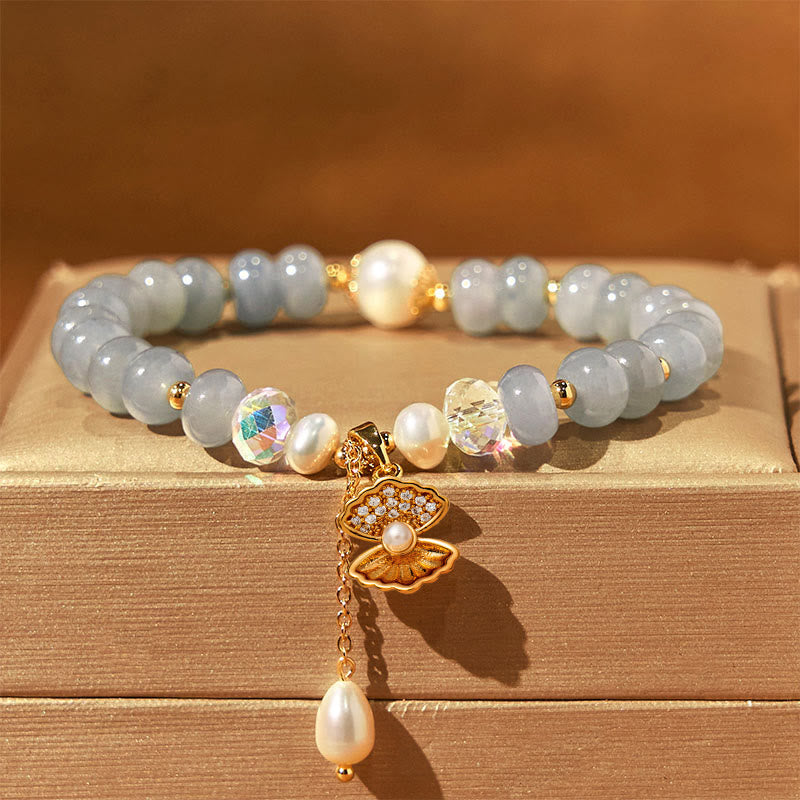 Bracelet de perles de guérison en coquillages et aigue-marines naturelles de Buddha Stones