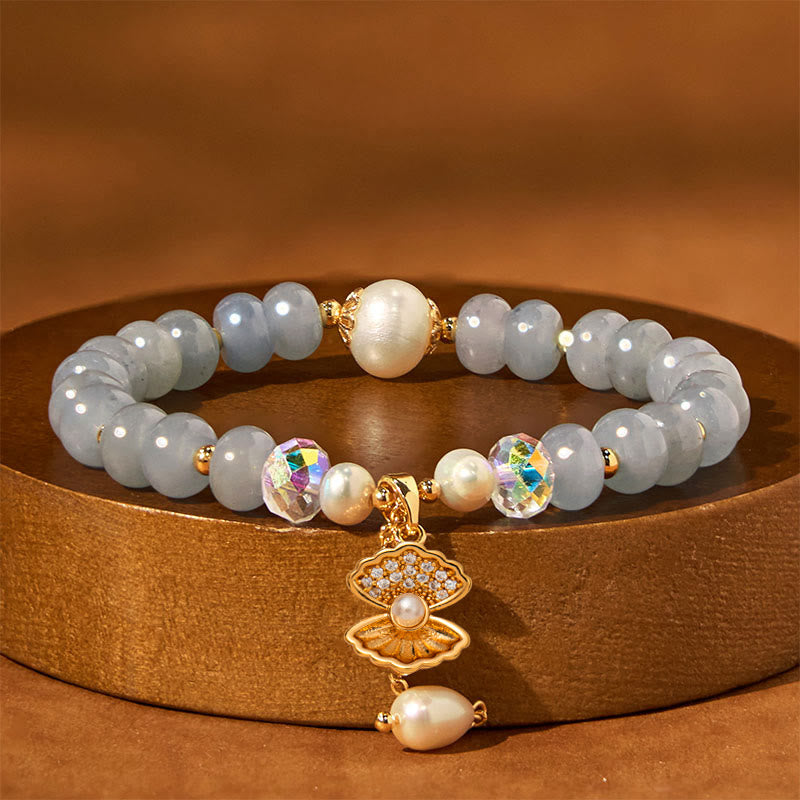 Bracelet de perles de guérison en coquillages et aigue-marines naturelles de Buddha Stones