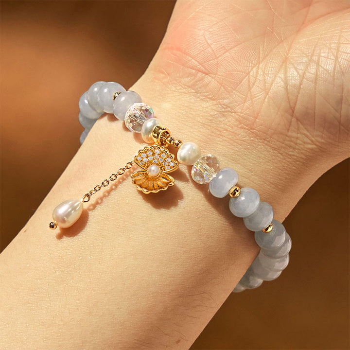 Bracelet de perles de guérison en coquillages et aigue-marines naturelles de Buddha Stones