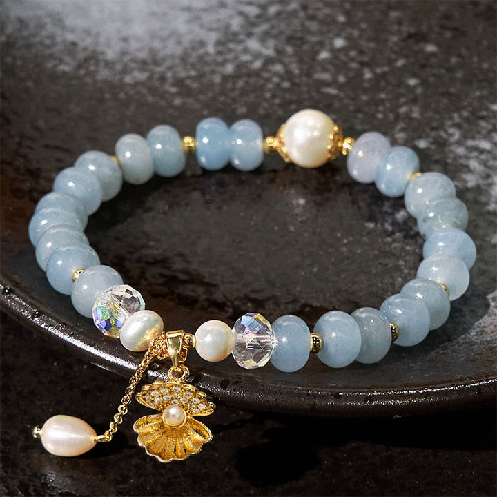 Bracelet de perles de guérison en coquillages et aigue-marines naturelles de Buddha Stones