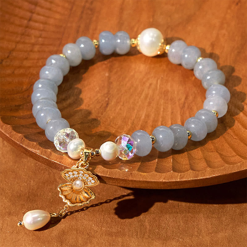 Bracelet de perles de guérison en coquillages et aigue-marines naturelles de Buddha Stones