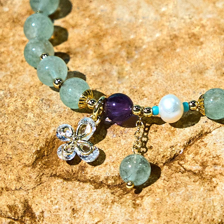 Bracelet d'amour avec breloque papillon en quartz fraise vert et quartz fraise naturel Buddha Stones