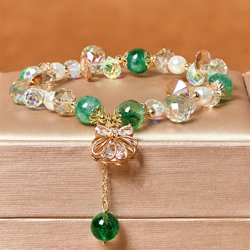 Bracelet positif en quartz fraise naturel et perles de coquillage Buddha Stones