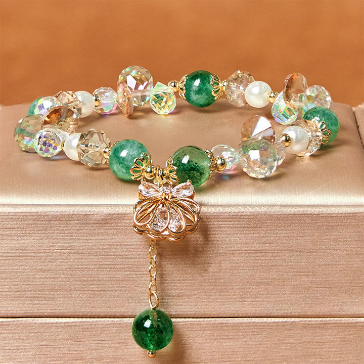Bracelet positif en quartz fraise naturel et perles de coquillage Buddha Stones
