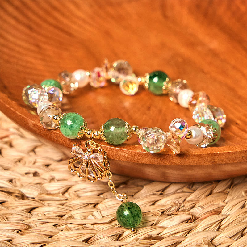 Bracelet positif en quartz fraise naturel et perles de coquillage Buddha Stones