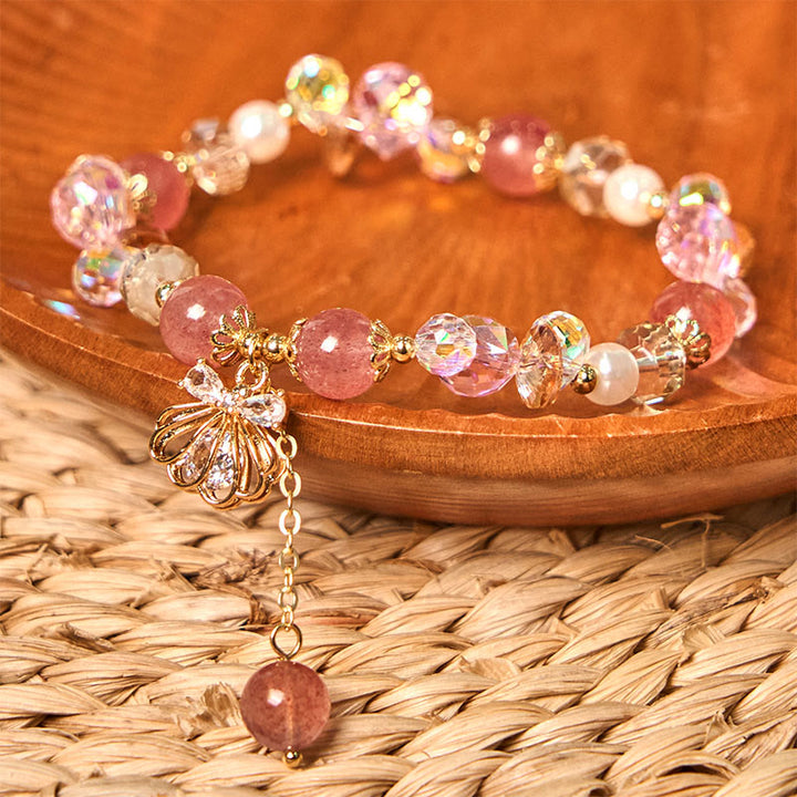 Bracelet positif en quartz fraise naturel et perles de coquillage Buddha Stones