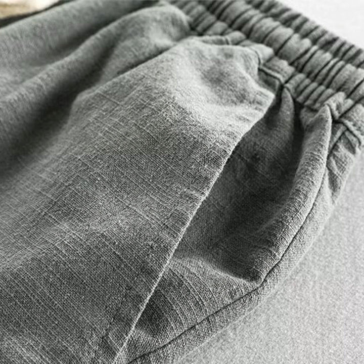 Short homme en coton et lin avec cordon de serrage et taille élastique et poches Motif Buddha Stones