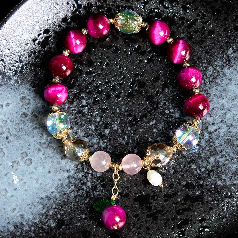 Bracelet de protection en Buddha Stones, œil de tigre rouge, violet, feuilles vertes - image 1