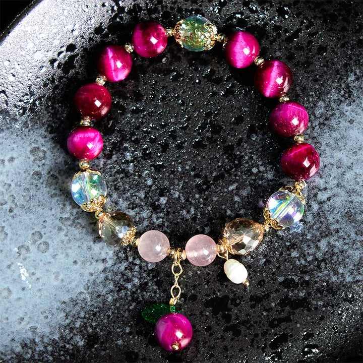 Bracelet de protection en Buddha Stones, œil de tigre rouge, violet, feuilles vertes