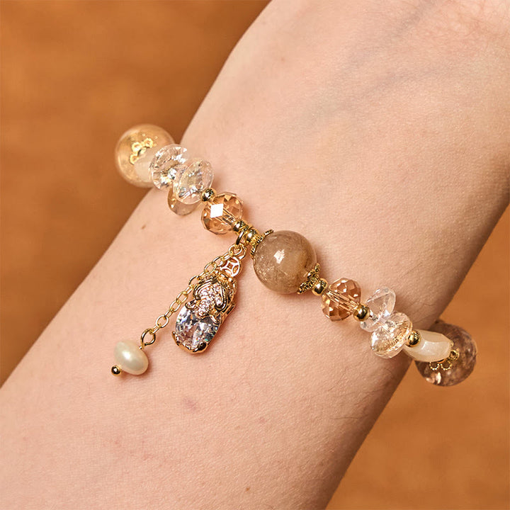 Bracelet de prospérité PiXiu en quartz fraise vert et Buddha Stones