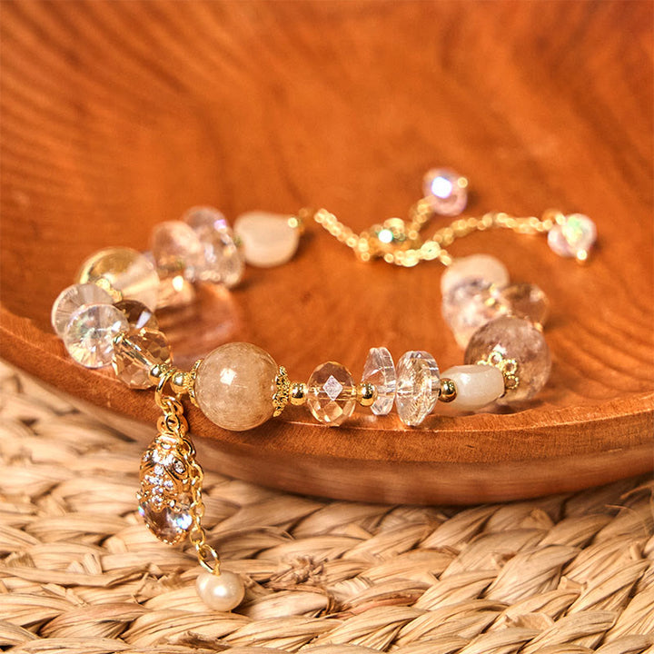Bracelet de prospérité PiXiu en quartz fraise vert et Buddha Stones