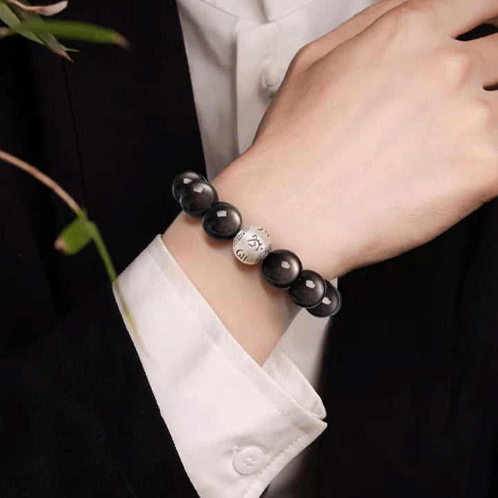 Bracelet de protection Om Mani Padme Hum en obsidienne naturelle Buddha Stones et brillante