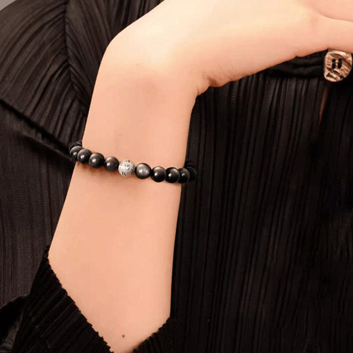 Bracelet de protection Om Mani Padme Hum en obsidienne naturelle Buddha Stones et brillante