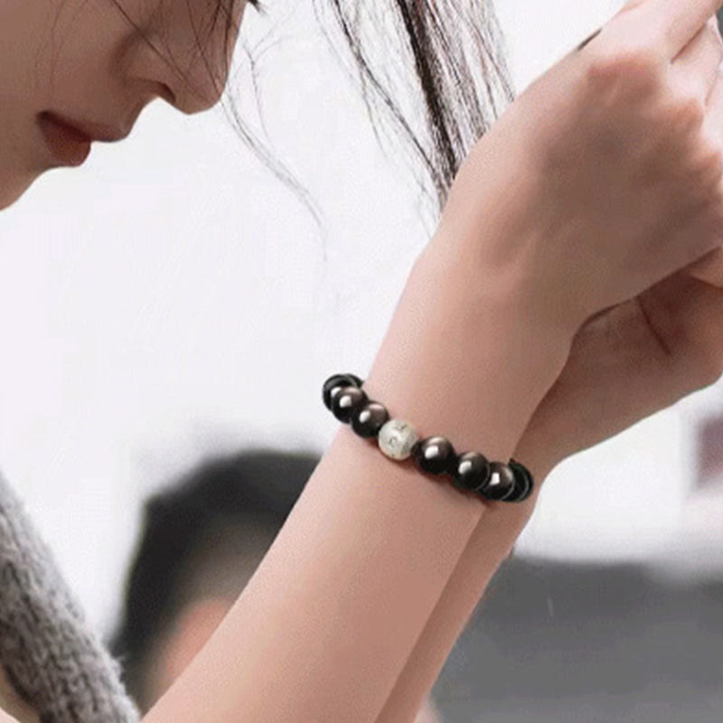 Bracelet de protection Om Mani Padme Hum en obsidienne naturelle Buddha Stones et brillante