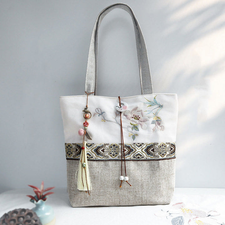 Sac à bandoulière en toile polyester brodé Buddha Stones Magnolia