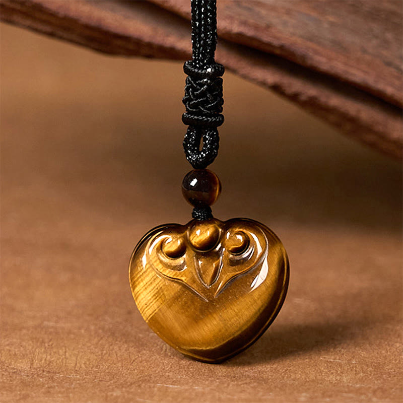 Collier pendentif en corde de protection avec motif cœur et œil de tigre naturel en Buddha Stones
