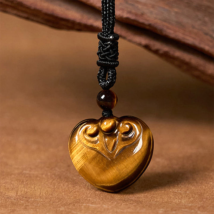 Collier pendentif en corde de protection avec motif cœur et œil de tigre naturel en Buddha Stones