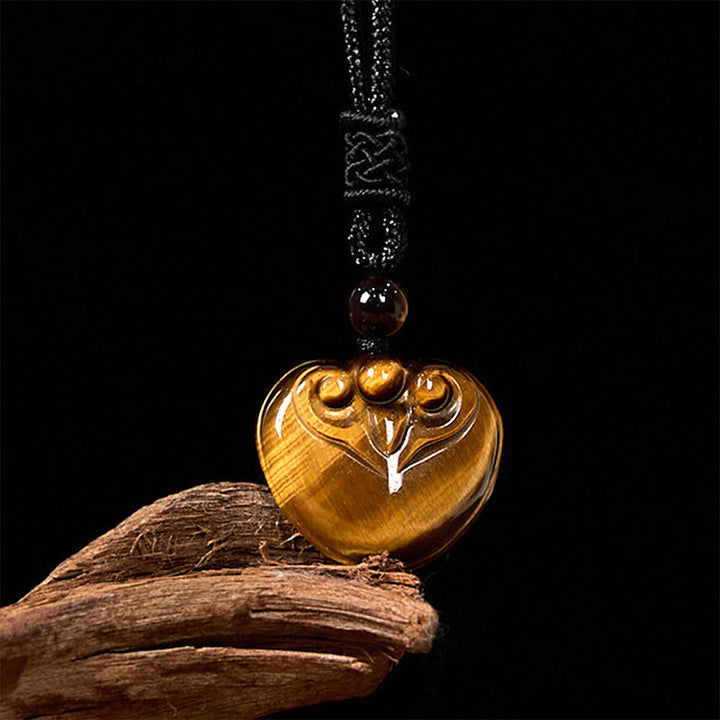 Collier pendentif en corde de protection avec motif cœur et œil de tigre naturel en Buddha Stones