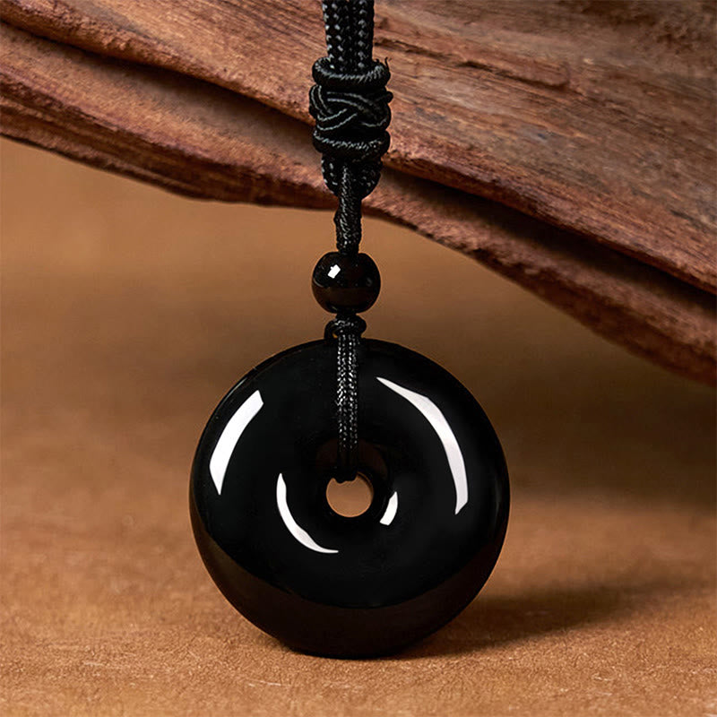 Buddha Stones Collier avec pendentif en corde de force et boucle de paix en obsidienne noire naturelle