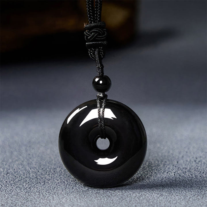 Buddha Stones Collier avec pendentif en corde de force et boucle de paix en obsidienne noire naturelle