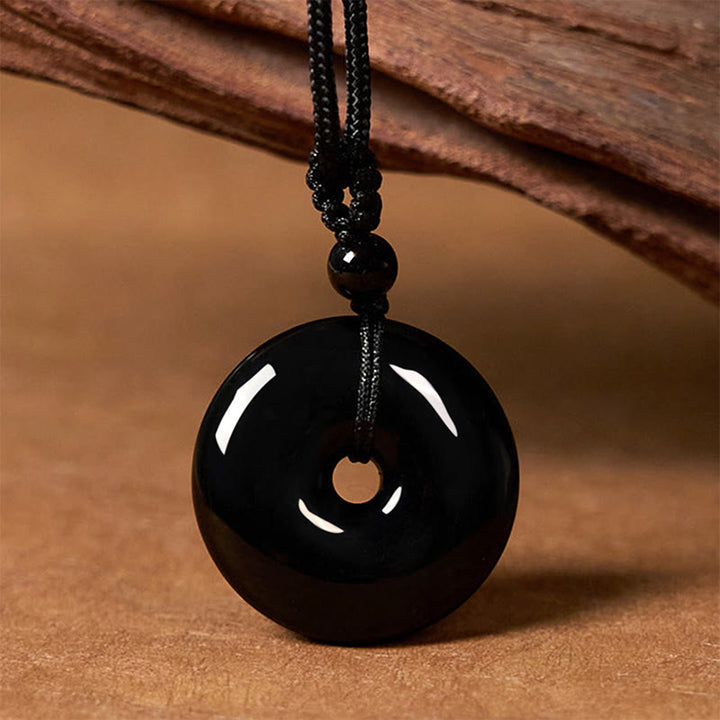 Buddha Stones Collier avec pendentif en corde de force et boucle de paix en obsidienne noire naturelle