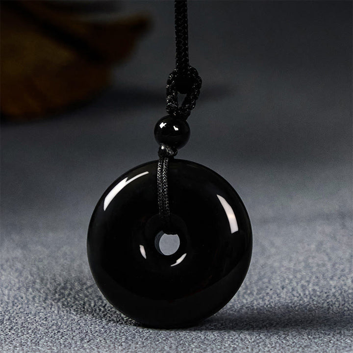 Buddha Stones Collier avec pendentif en corde de force et boucle de paix en obsidienne noire naturelle