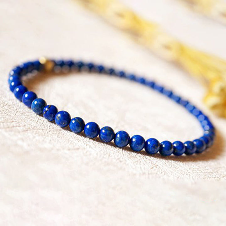 Bracelet de soins personnels ultra-fin en perles de lazurite de 4 mm de Buddha Stones