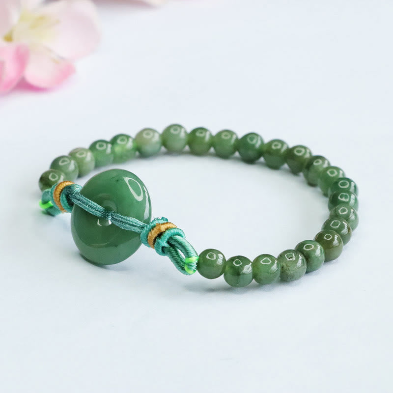 Bracelet de prospérité avec boucle de paix et perles de jade en Buddha Stones