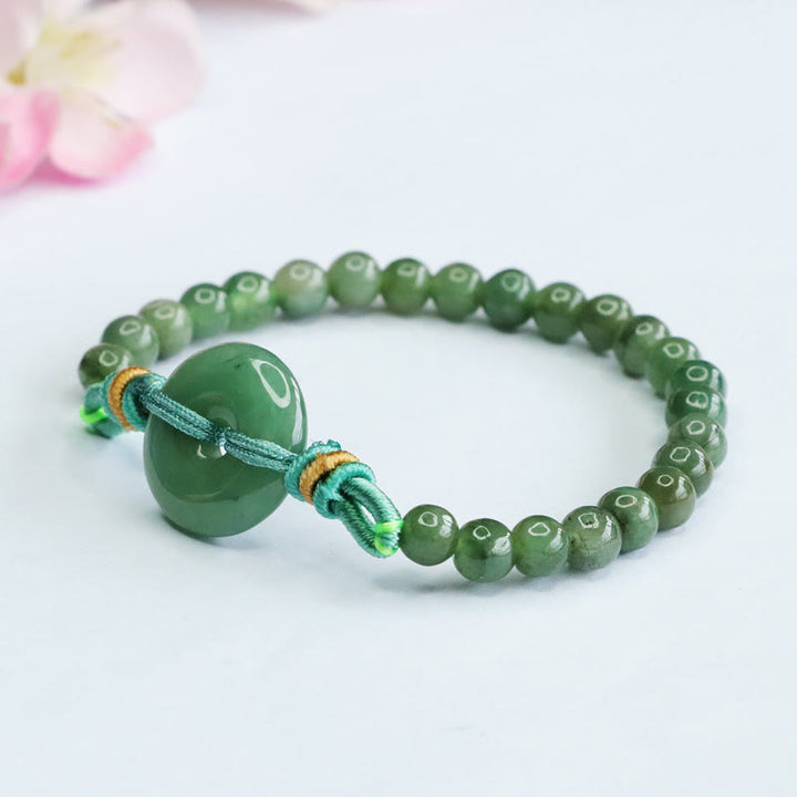 Bracelet de prospérité avec boucle de paix et perles de jade en Buddha Stones