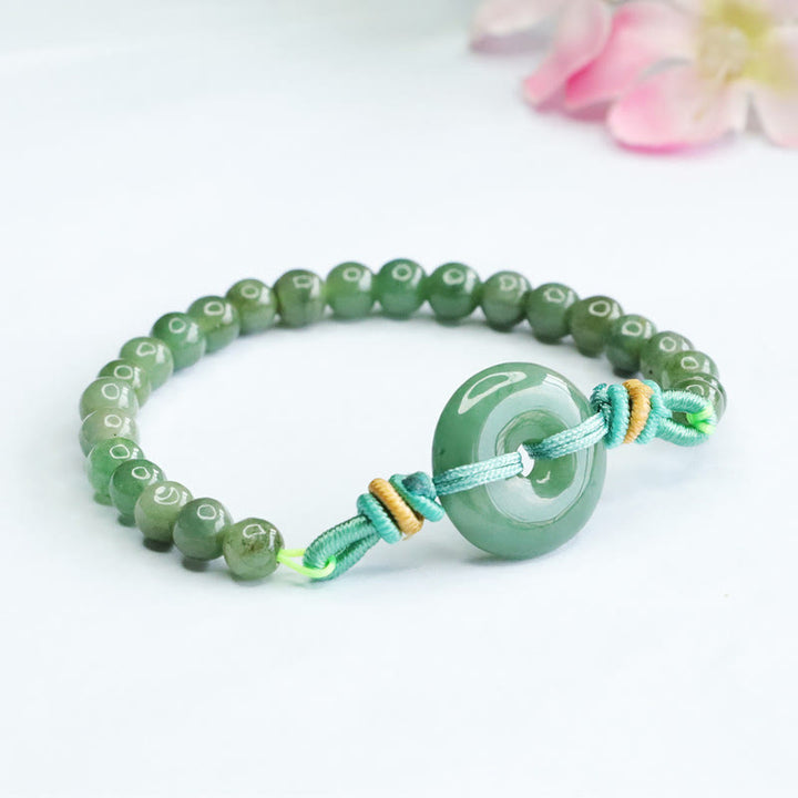 Bracelet de prospérité avec boucle de paix et perles de jade en Buddha Stones