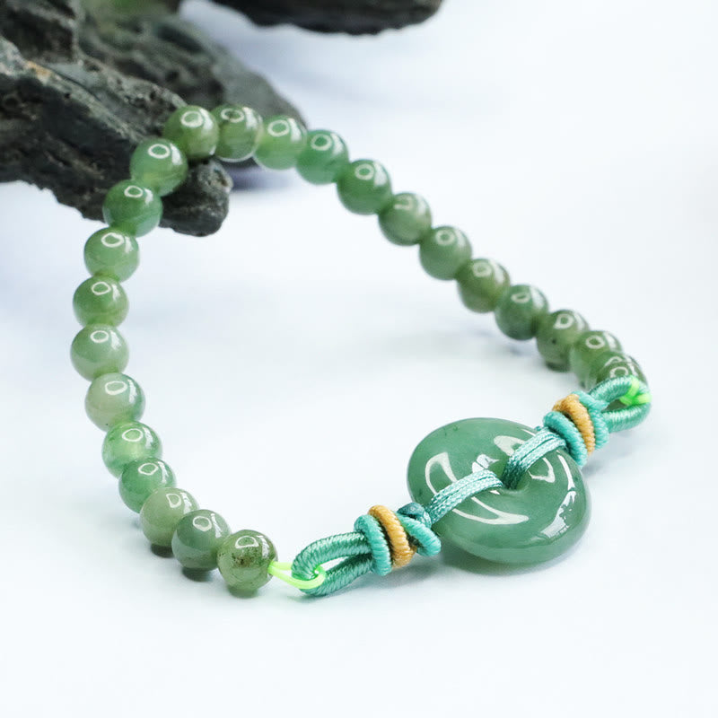 Bracelet de prospérité avec boucle de paix et perles de jade en Buddha Stones