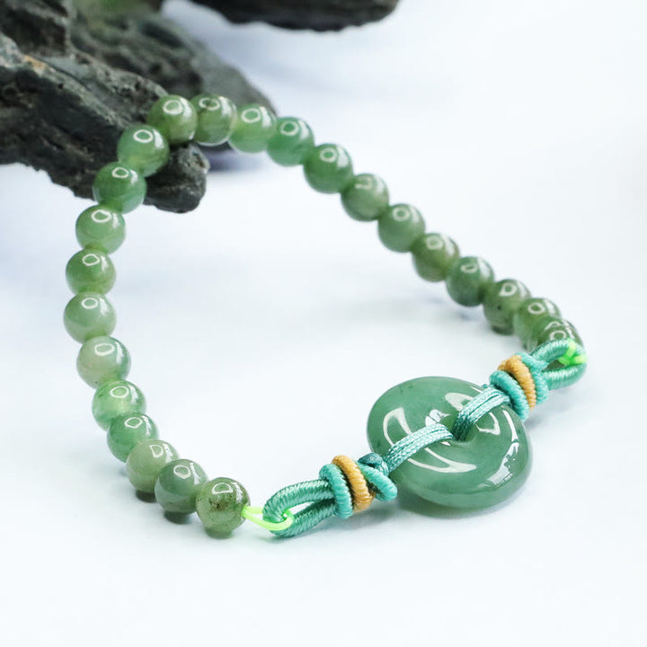 Bracelet de prospérité avec boucle de paix et perles de jade en Buddha Stones