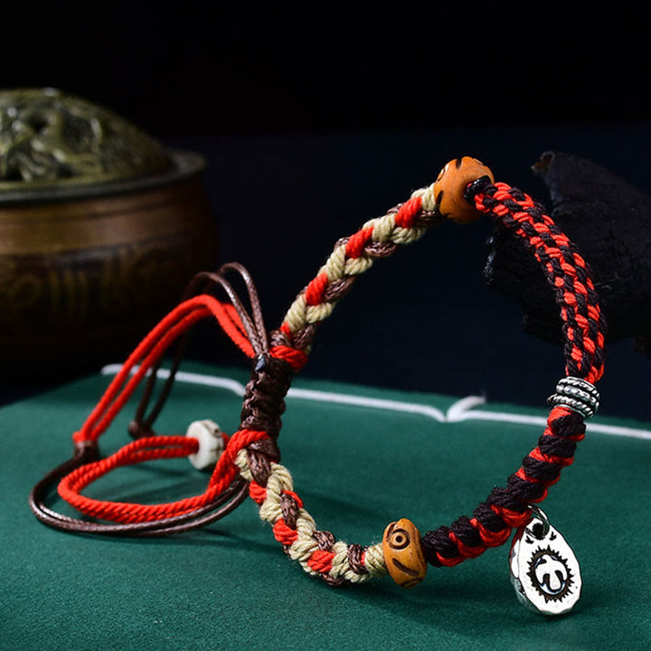 Bracelet porte-bonheur tibétain en Buddha Stones tissé à la main avec cordon Garuda