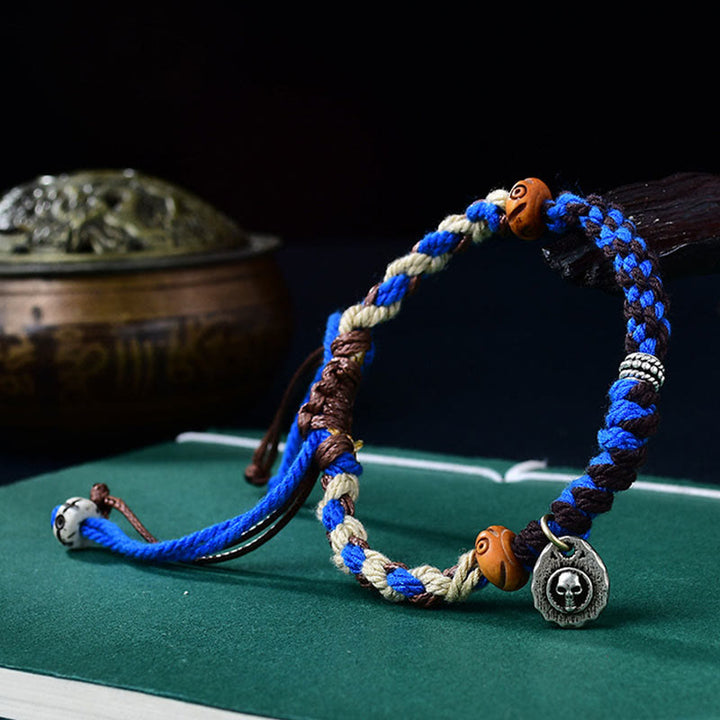 Bracelet porte-bonheur tibétain en Buddha Stones tissé à la main avec cordon Garuda