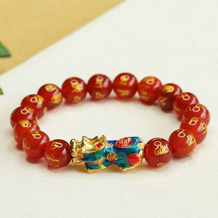 Bracelet PiXiu Om Mani Padme Hum Calm en Buddha Stones et agate rouge changeant de couleur
