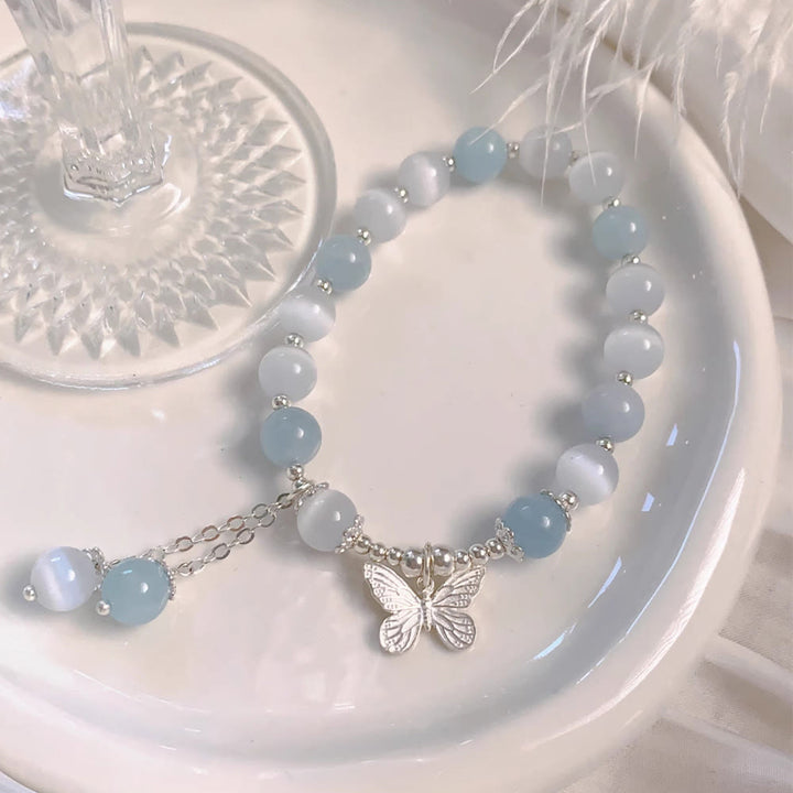Bracelet de soutien à breloques papillon en aigue-marine œil de chat et Buddha Stones