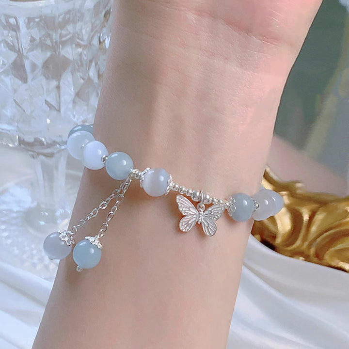 Bracelet de soutien à breloques papillon en aigue-marine œil de chat et Buddha Stones