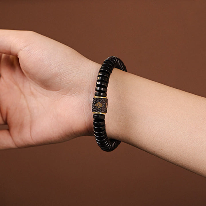 Bracelet tibétain en Buddha Stones et coquille de noix de coco avec nuages de bon augure