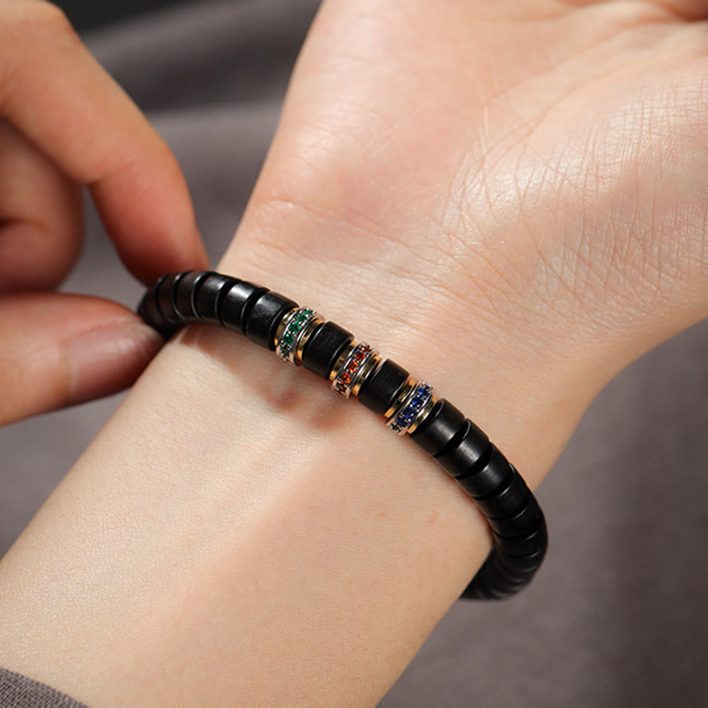 Bracelet de paix en bois d' Buddha Stones et petites feuilles de santal rouge et zircon