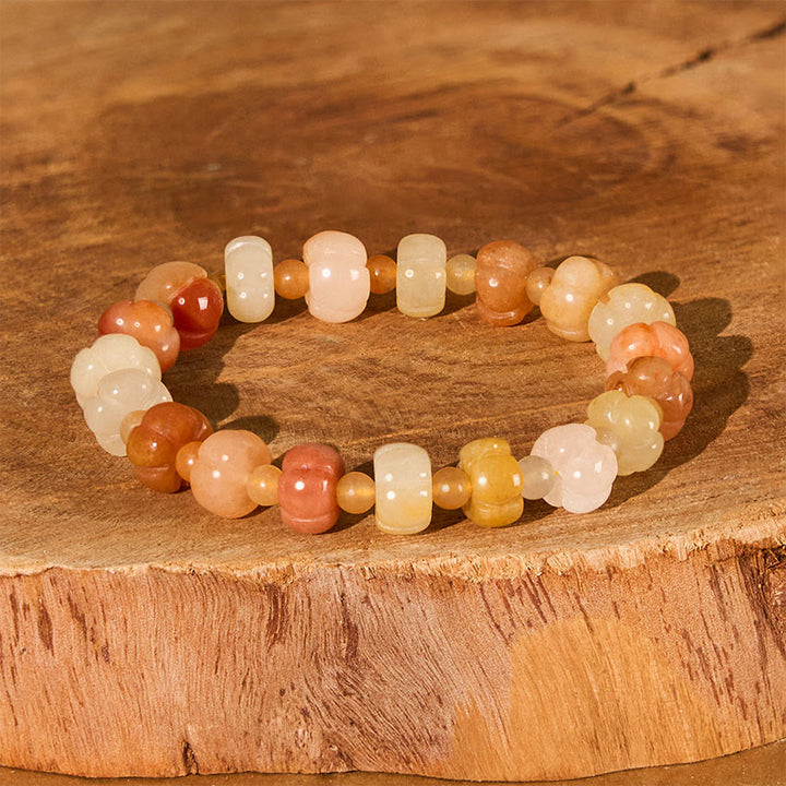 Bracelet Buddha Stones, soie dorée, jade, perles citrouille, richesse, chance