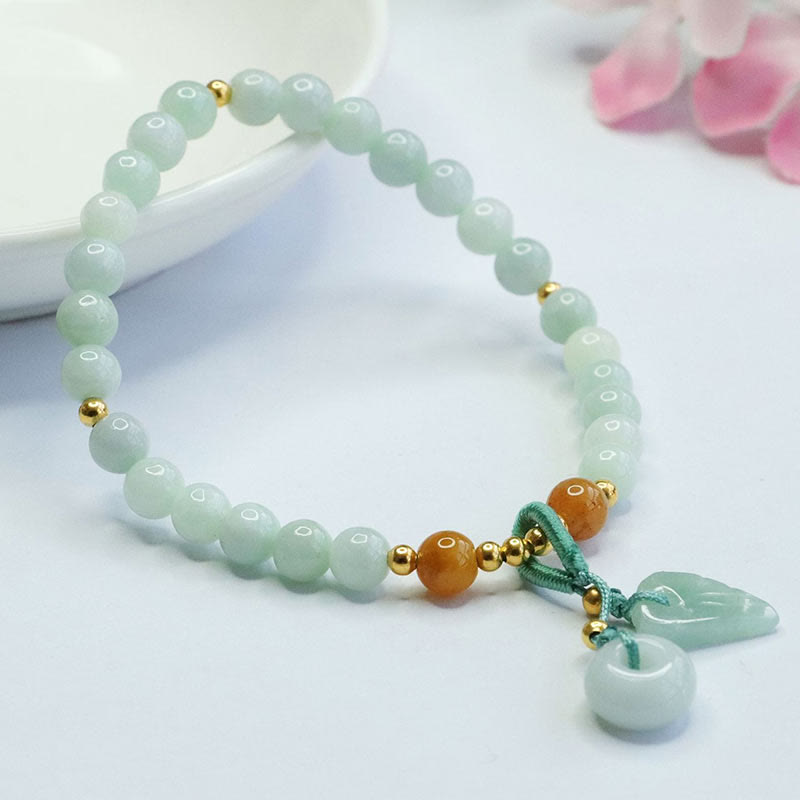 Bracelet de prospérité avec boucle de paix et perles de jade en Buddha Stones