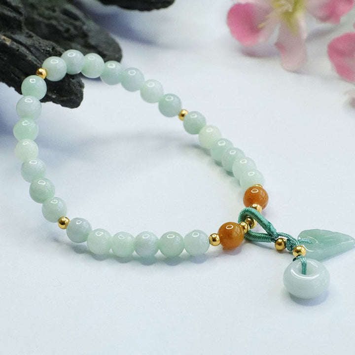 Bracelet de prospérité avec boucle de paix et perles de jade en Buddha Stones