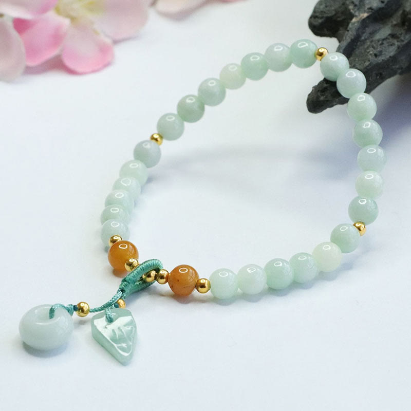 Bracelet de prospérité avec boucle de paix et perles de jade en Buddha Stones