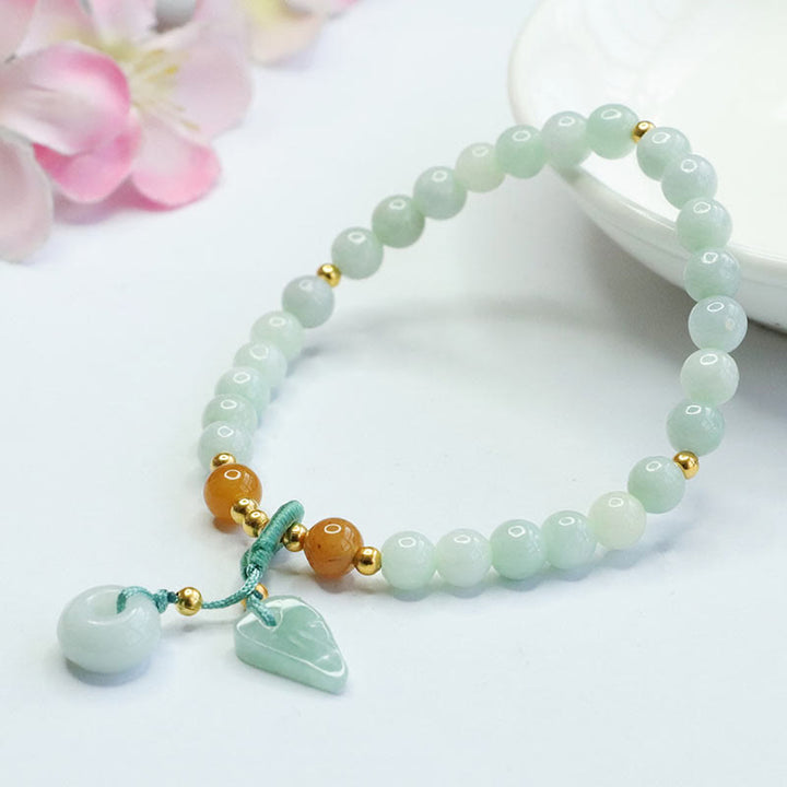 Bracelet de prospérité avec boucle de paix et perles de jade en Buddha Stones