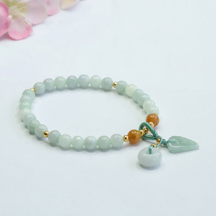 Bracelet de prospérité avec boucle de paix et perles de jade en Buddha Stones