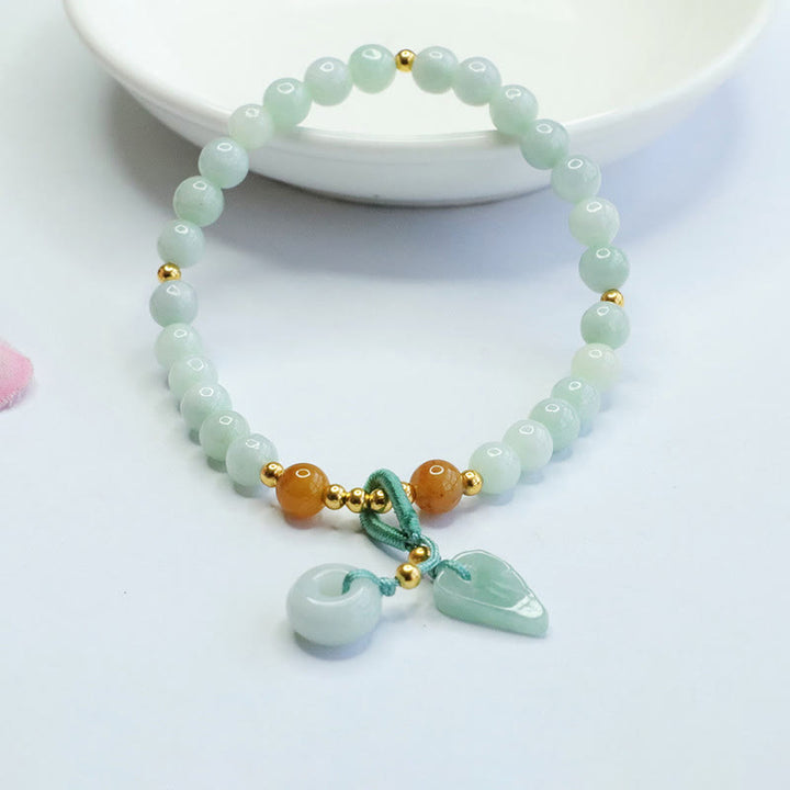 Bracelet de prospérité avec boucle de paix et perles de jade en Buddha Stones