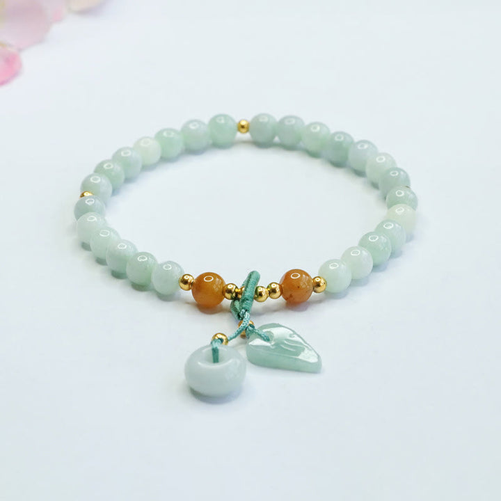 Bracelet de prospérité avec boucle de paix et perles de jade en Buddha Stones