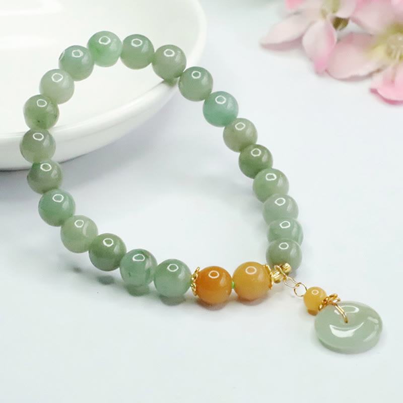Bracelet de prospérité et d'abondance en perles de jade et Buddha Stones
