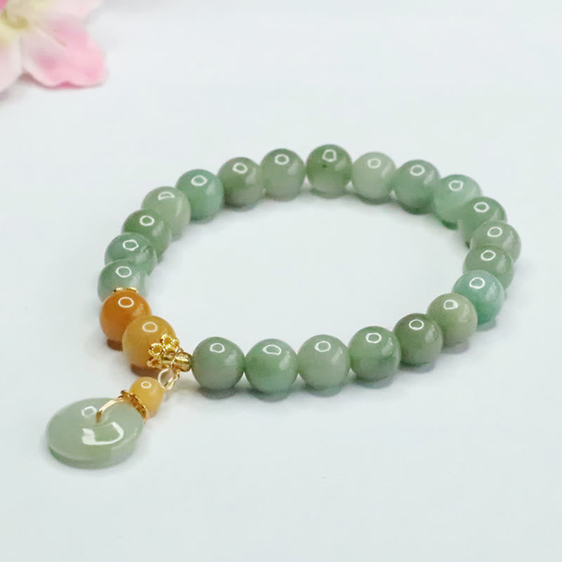 Bracelet de prospérité et d'abondance en perles de jade et Buddha Stones